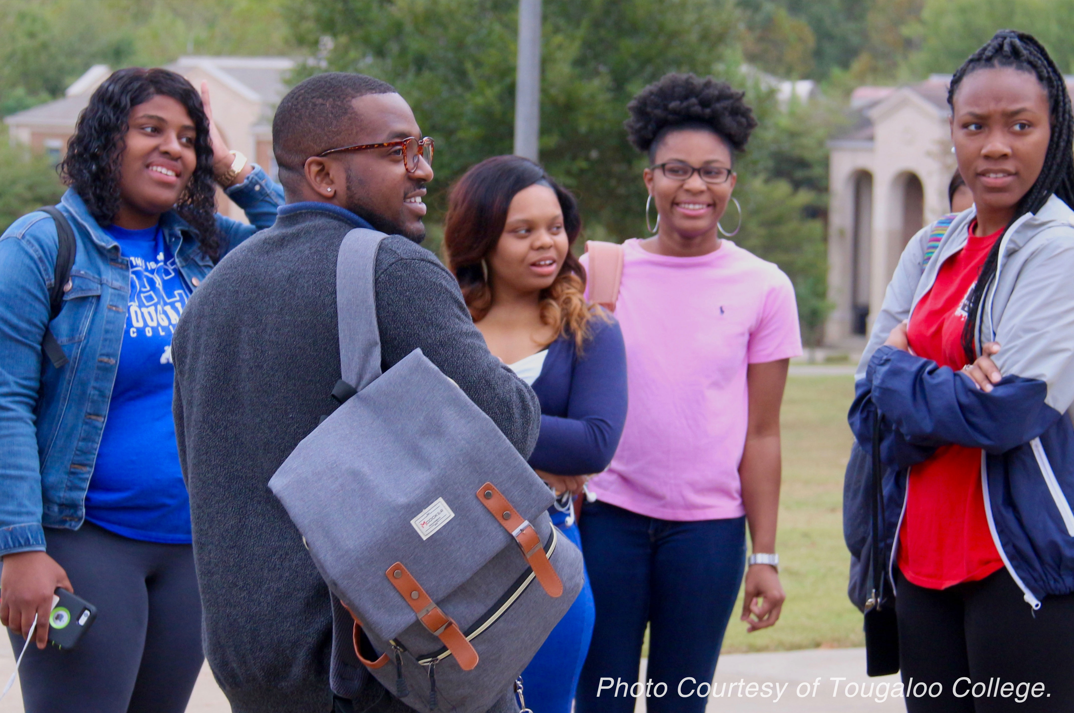 A group of students on campus at Tougaloo College.