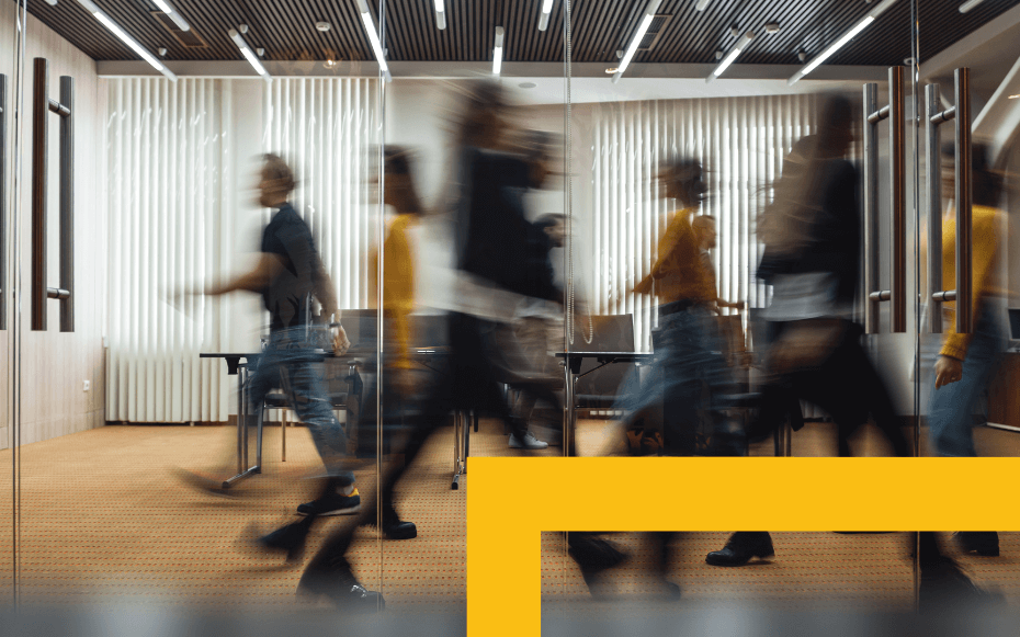 People walking in an office.