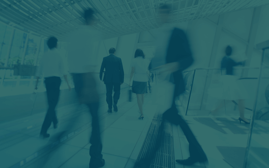 A filtered image of people in a workplace.