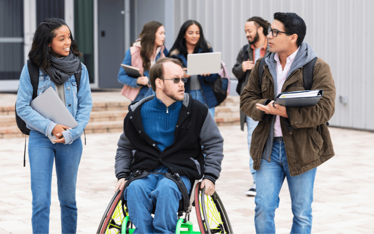 College students talking on campus.