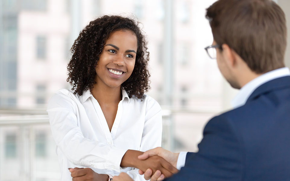 A hiring manager interviews a job candidate.