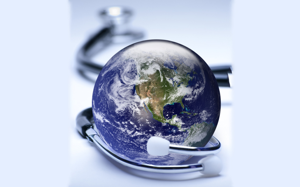 An image of a globe and a stethoscope.