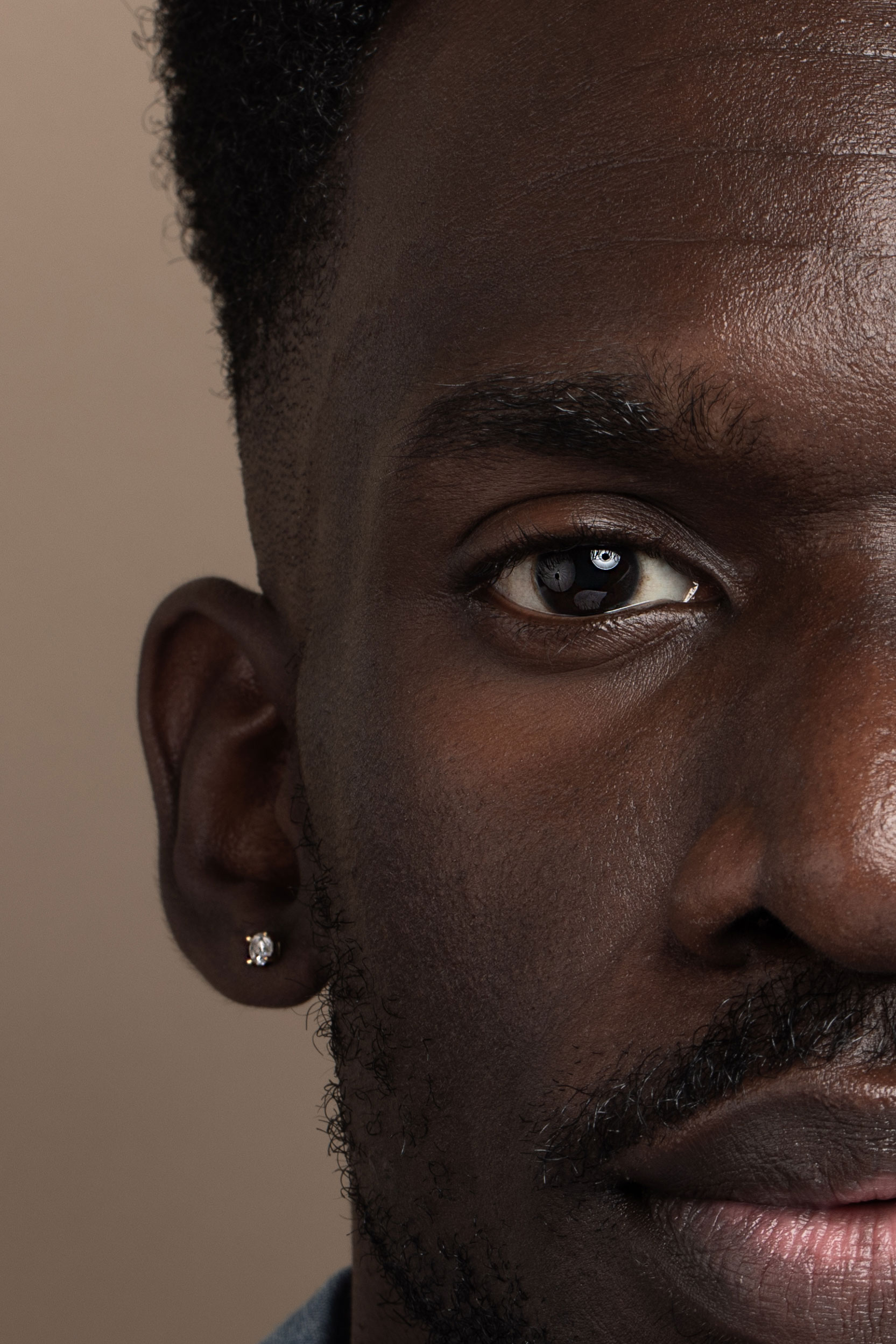 A stunning close up portrait of a Black man.